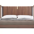 Modern Double Bed With Wooden Walnut Headboard Metal Accent White Pillows And Gray Bedspread