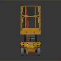 Yellow Industrial Scissor Lift With Guard Rails Red Fire Extinguisher And Four Wheels