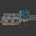 Industrial Machinery Structure With Metal Pipes Frame Blue Control Panel And Scattered Parts
