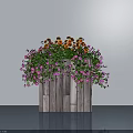 Decorative Potted Plant In Wooden Planter With Orange And Pink Flowers And Green Leaves