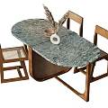 Oval Dining Table Set With Green Marble Top And Wooden Woven Chairs And Vase Decor