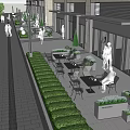 Modern Commercial Street With Pedestrian Walkway Outdoor Seating And Green Plants