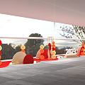 Indoor Celebration Setup With Red Orange Balloons Fan Shaped Decorations And Large Windows
