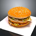 Delicious Hamburger With Sesame Bun Lettuce And Patty On White Paper
