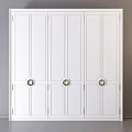 Elegant White Dresser With Circular Brass Handles And Modern Design