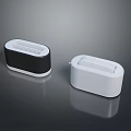 Two Compact Electronic Devices With Black And White Simple Design For Desktop Use