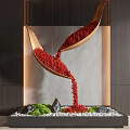 Contemporary Indoor Landscape With Hanging Scoop Structures Flowing Red Particles Green Moss Stones White Pebbles