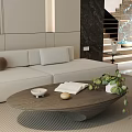 Modern Beige Sectional Sofa and Coffee Table Set With Decorative Pillows and Green Plant