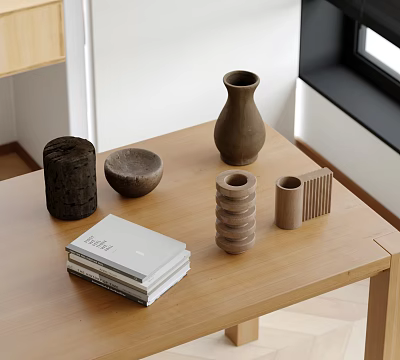 Various Shaped Ceramic Vessels on Wooden Table with Stack of Books in Indoor Setting 3d model