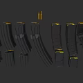 Black and Yellow Weapon Magazines in Various Shapes and Sizes on Black Background