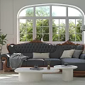 Black Carved Sofa With Wooden Accents And White Round Coffee Table Set With Green Plants