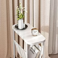 Minimalist White Side Table With Vase Clock And Magazines In Bedroom Setting