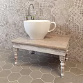 White Ceramic Bathtub With Cup Handle On Hexagonal Floor Tiles And Patterned Tiled Wall
