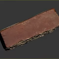 Close Up View Of Red Construction Brick With White Patches And Rough Surface Texture