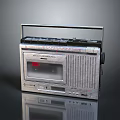 Vintage Portable Cassette Player Radio With Silver Body And Retro Design