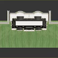 Miniature Residential Model House with Black Roof and Windows on Green Lawn