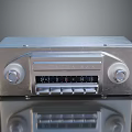 Vintage Electronic Radio With Silver Metal Case Knobs And Dial