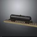 Black Tank Car Model Placed On Railway Track With Gravel