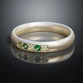 Elegant Silver Band Ring With Green Gemstones And White Accent Stones Design