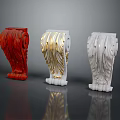 Three Ornamental Carved Columns In Red Gold And White Colors