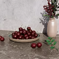 Fresh Red Cherries in Ceramic Bowl on Gray Countertop with Vase and Green Leaves