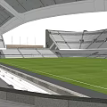Historic Style Football Stadium With Large Stands Green Pitch And Entrance Area