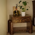 Wooden Bedside Table With Cylindrical Legs White Planter Green Plant And Portrait Painting Near Bed