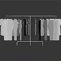 Circular White Clothes Hanger With Hanging White T-shirts On Reflective Surface