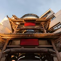 Exquisite Traditional Chinese Wooden Carved Paifang Eave Architectural Component With Surrounding Modern Building Facade
