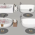 Modern White Bathtub with Red Petals Slippers Mat and Toiletries Setup
