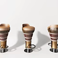 Three Modern Curved Brown Bar Stools With Metallic Metal Base Design