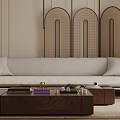 Light Beige Three Seater Sofa with Cushions Against Arched Rattan Wall and Wooden Coffee Table