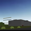 Modern Industrial Factory Exterior With Yellow Green Blue Horizontal Colorful Stripes Windows Along Roadside