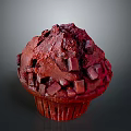 Delicious Red Cupcake Topped With Chocolate Chunks And Smooth Creamy Frosting