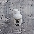White Dome Security Surveillance Camera Mounted On Outdoor Concrete Wall Surface 3d model