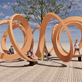 Outdoor Chair with Circular Orange Design Where People Sit Around a Tree for Relaxation