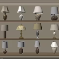 Various Stylish Table Lamps Displayed on Wooden Shelves with Decorative Bases