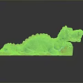 Vibrant Green Dragon Sculpture With Red Accents Lying On Brown Base Artistic
