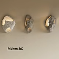 Unique Shaped Wall Lamps by Molteni&C Stone Inspired Design with Warm Glow Illumination