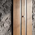 Natural Stone Textured Wall With Wooden Panels And Black Metal Strips