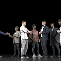 Group of Men in Suits Casual Wear and Lab Coats Interacting and Talking Together