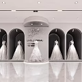 Elegant Modern Bridal Shop Interior With White Wedding Dresses And Curved Lighting