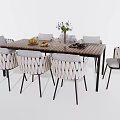 Wooden Dining Table and Chairs Set with Woven Seats Black Metal Legs and Fruits Vase