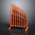 Orange Tubular Equipment With Multiple Long Pipes Arranged On Stand Structure
