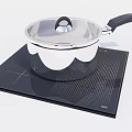 Stainless Steel Cooking Pot With Lid And Black Handle On Black Grid Cooktop