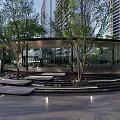 Modern Residential Landscape With High Rise Buildings Green Trees And Serene Pavilion Steps