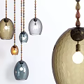 Modern Glass Pendant Lights With Colored Shades Beaded Chains And Textured Designs