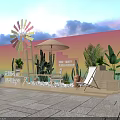 Colorful Windmill Outdoor Seating Area With Umbrella Cacti Plants And Stone Pavement