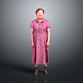 Woman in Pink Floral Dress with Neatly Styled Hair and Gray Shoes Against Gray Background