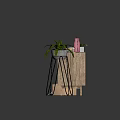 Wooden Dresser with Colorful Drawers Plant Stand Green Plant Vase Book and Wooden Box Towel